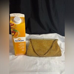 Gold tone beaded evening purse with MOP closure/beaded handle